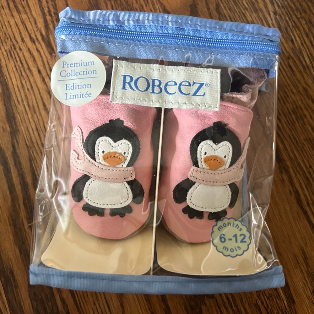 Brand new pink penguin robeez